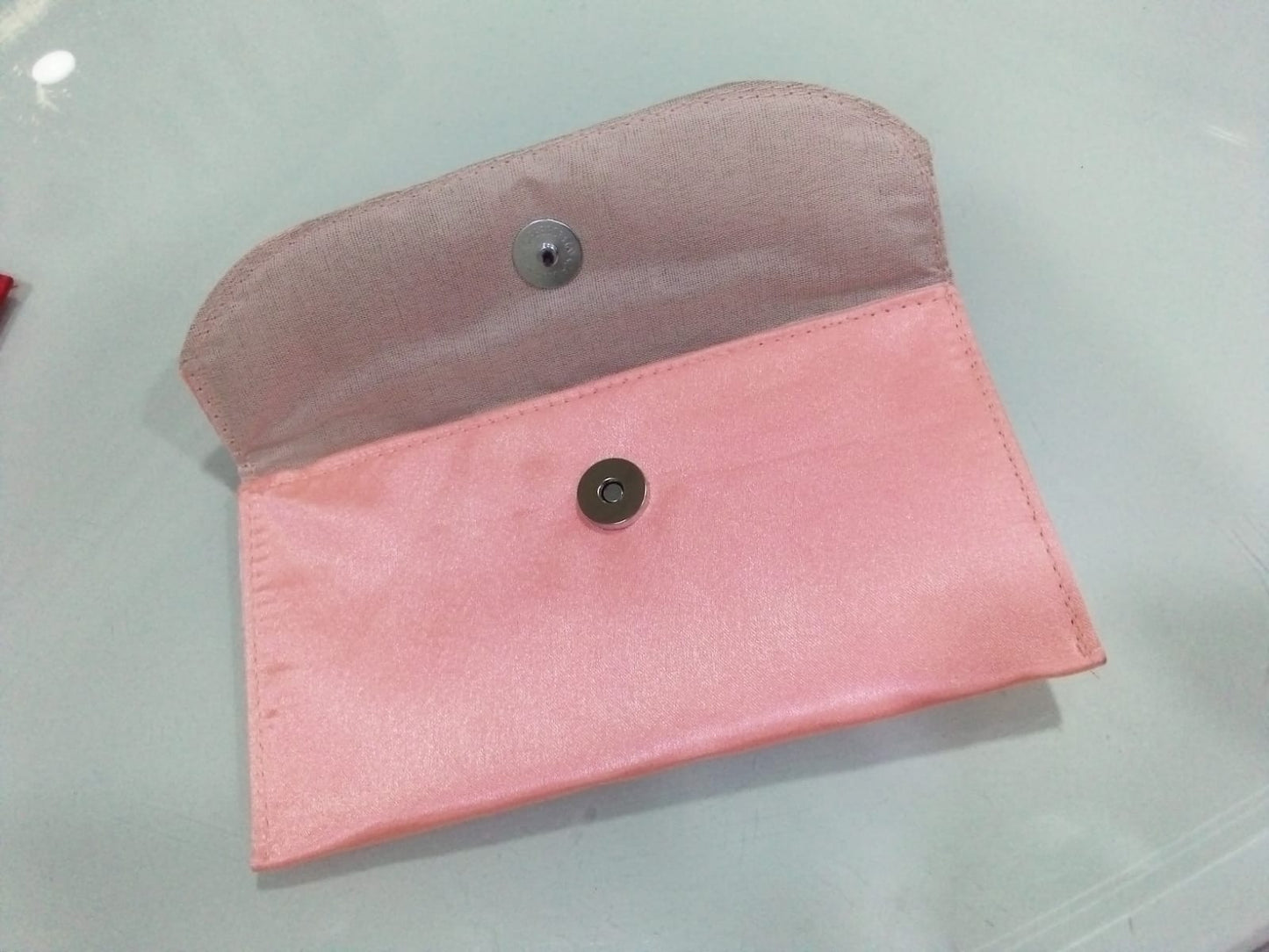 Pastel Peach Satin Festive Clutch with Peacock & Pearl Motifs