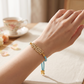 CZ Stones Bhabhi Rakhi with Blue Thread Gold Plated