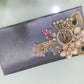 Sleek Grey Satin Festive Clutch with Gold Peacock & Pearl Accents